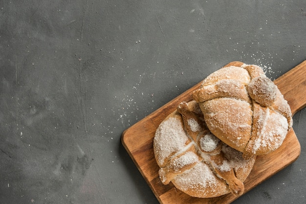 Pan de muerto with typical Mexican food