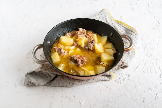 Photo pan with cooked potato fried meat balls with herbs and spices