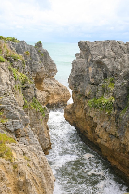 The Pancake Rocks are a heavily eroded limestone area where the sea bursts through several blowholes