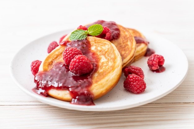 pancake with fresh raspberries and raspberry sauce