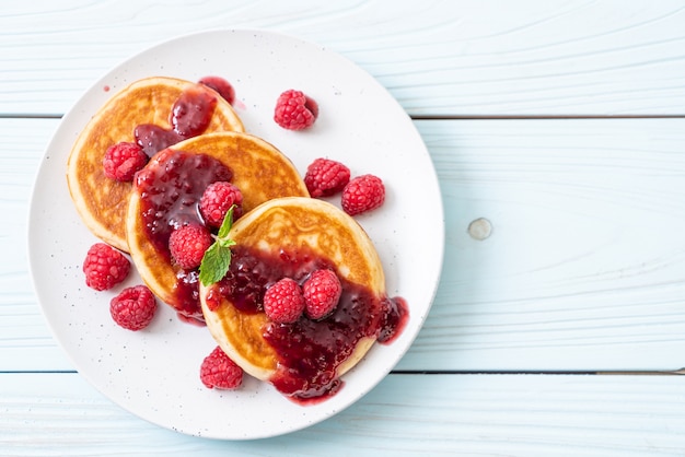 pancake with fresh raspberries and raspberry sauce