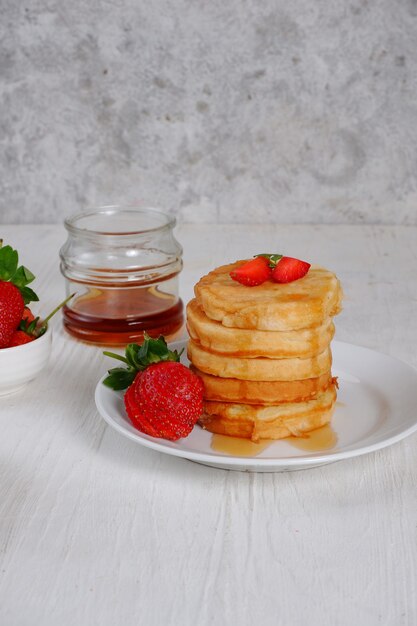 pancake with strawberry and syrup