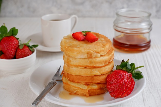 pancake with strawberry and syrup