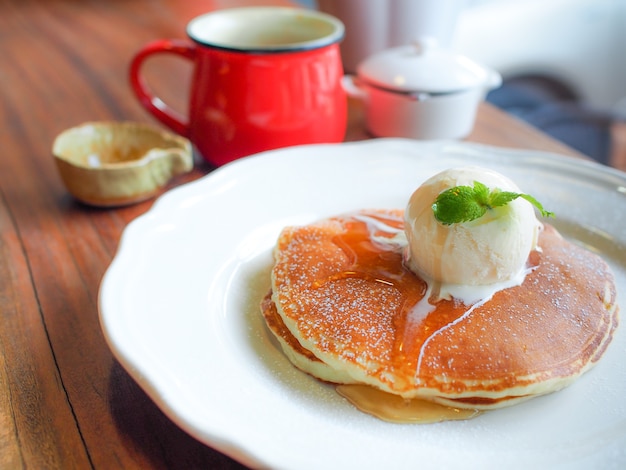 pancakes in honey syrup and ice cream   