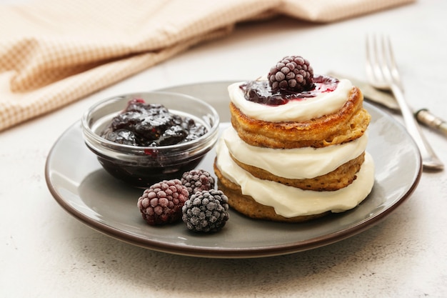 Pancakes with berry and jam