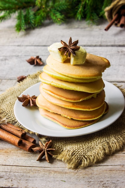 Pancakes with honey and butter. Selective focus.