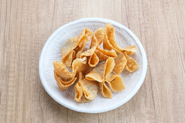 Pangsit Goreng (Chicken Fried Dumpling), Indonesian Traditional Food. Served with sauce