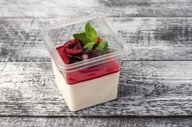 Panna cotta panna cotta dessert takeaway white wooden background