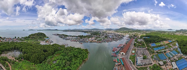 Panorama aerial view of fishing village and large fishing port around the island in Phuket city Thailand