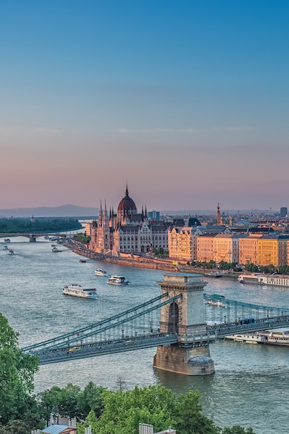 Panorama of Budapest at sunset  Hungarian landmarks: Chain Bridge Parliament and Danube river in Budapest