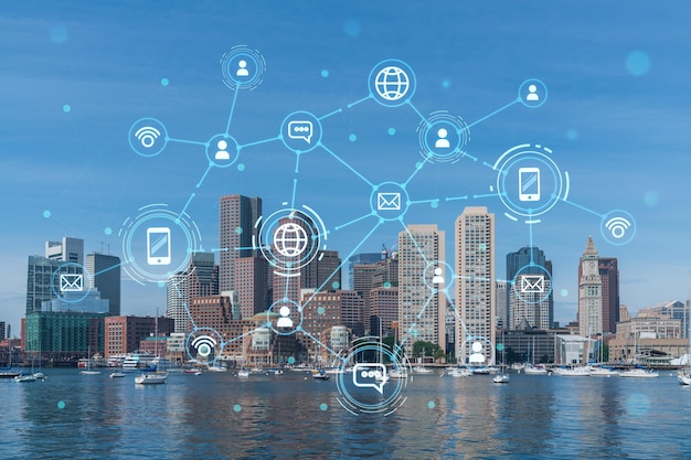 Panorama city view of Boston Harbor at day time Massachusetts Buildings of financial downtown Glowing Social media icons The concept of networking and establishing new connections between people