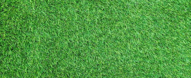 Panorama of green artificial turf flooring texture and background seamless