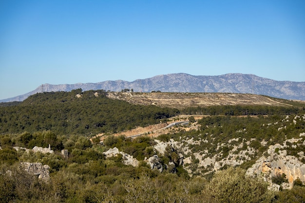 Panorama of the green valley opening from the top of the mountain