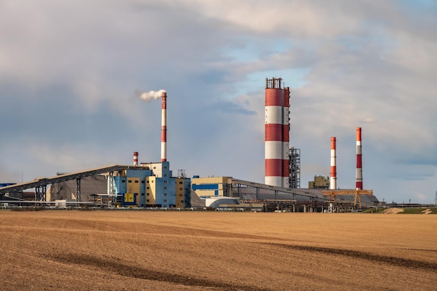 Panorama of industrial landscape environmental pollution waste of thermal power plant Big pipes of chemical industry enterprise plant