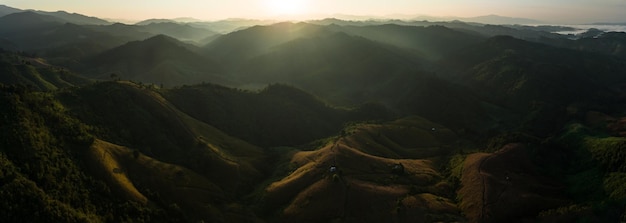 Panorama Landscape light and shadow of the mountain where the sun shines in the morning is a very beautiful and dramatic landscape aerial view panoramic photograph from drone for background