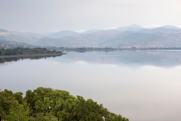 Panorama of a mountain lake Vegoritida in nom Florina on a sunny day Macedonia northwest Greece