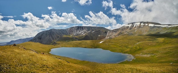 Panorama Mountain valley of Altai mountains fabulous Alpine landscape of the peaks of the ridges amazing views of the valley in summer Hike