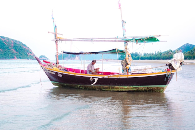 Panorama scenatic view of seascape with trsditional fishing boat and beautiful blue ocean South East Asia Thailand