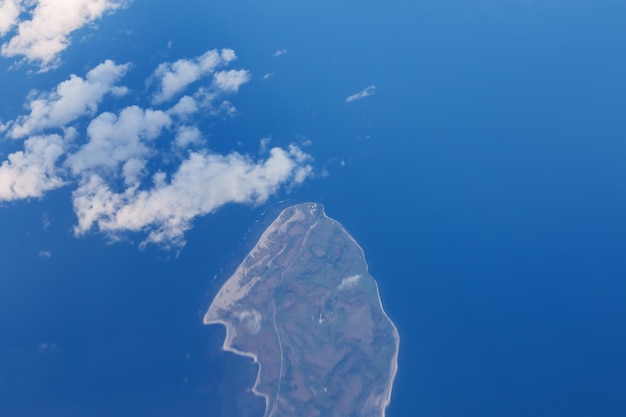 Panorama of sky with clouds at the bottom of the island