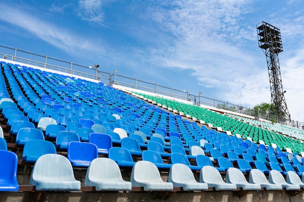 Panorama of stadium empty row seats on the open air place before concerts