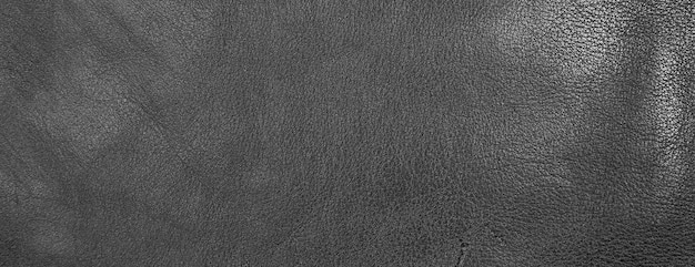 Panorama texture of black sheepskin cow leather processed