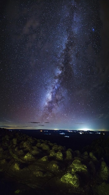 Panorama vertical Milky way galaxy with knob stone ground is name Lan Hin Pum viewpoint