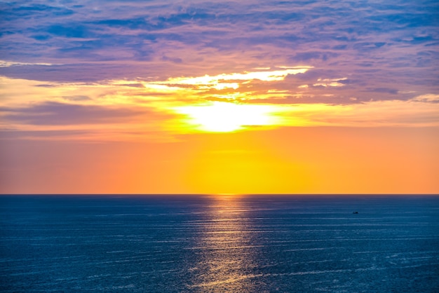 panorama view of blue sea with sunset