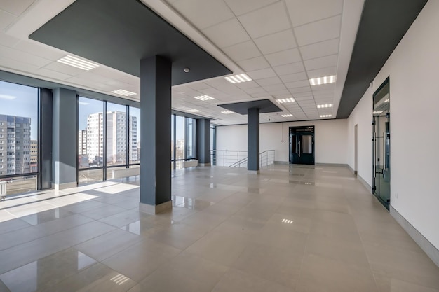 Panorama view in empty modern hall with columns doors and panoramic windows