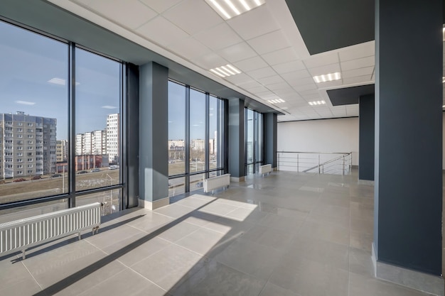 Panorama view in empty modern hall with columns doors and panoramic windows