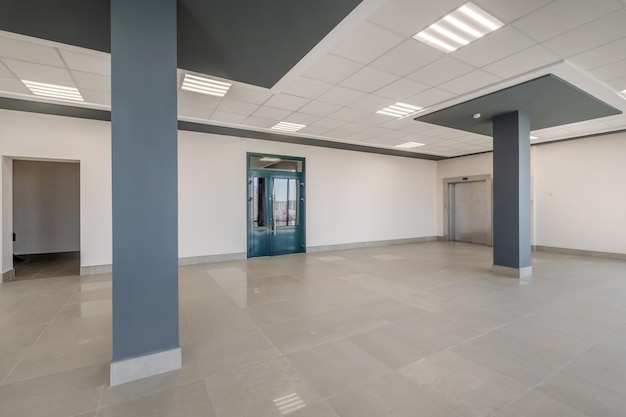 Panorama view in empty modern hall with columns doors and panoramic windows