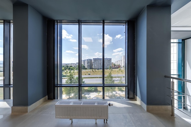 Panorama view in empty modern hall with columns doors and panoramic windows