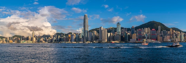 Photo panorama view of hong kong cityscape at sunset