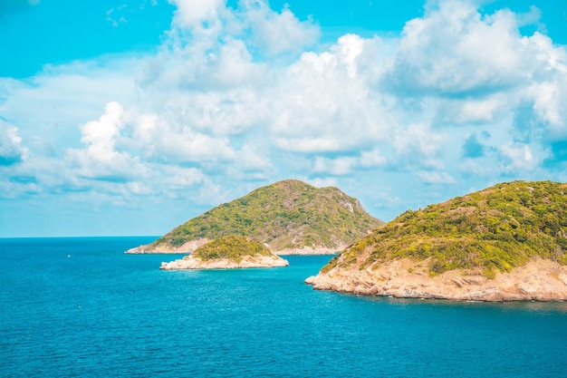 Panoramic coastal Con Dao view from above with waves coastline clear sky and road blue sea