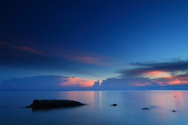 Panoramic dramatic tropical sunset sky and sea at dusk