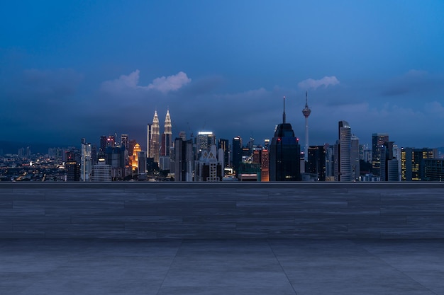 Panoramic Kuala Lumpur skyline view concrete observatory deck on rooftop night Asian corporate and residential lifestyle Financial city downtown real estate Product display mockup empty roof