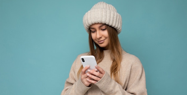 Panoramic photo shot of attractive positive good looking young woman wearing casual stylish outfit