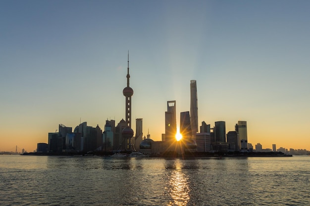 Panoramic Shanghai Skyline at Sunrise. Lujiazui Financial District and Huangpu River. View from The Bund Embankment. China.