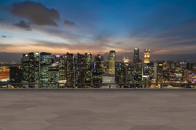 Panoramic Singapore skyline view concrete observatory deck on rooftop night time Asian corporate and residential lifestyle Financial city downtown real estate Product display mockup empty roof