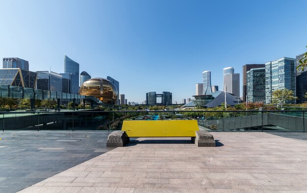 Panoramic skyline and buildings with empty concrete square floor in China