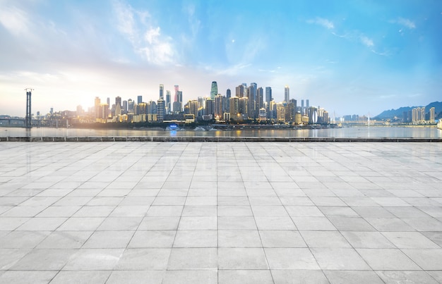 Panoramic skyline and buildings with empty concrete square floor, chongqing, china