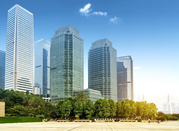 Panoramic skyline and buildings with empty concrete square floor