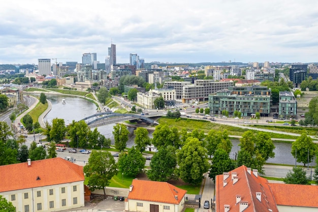 Panoramic summer view of Vilnius Cityscape with river modern buildings of Vilnius Lithuania