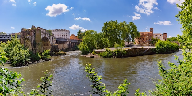 Panoramic vew of the Tiber island or Isola Tiberina in sunny day, Rome, Italy