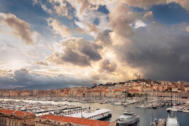 Panoramic view on basilica of notre dame de la garde and old port in marseille france