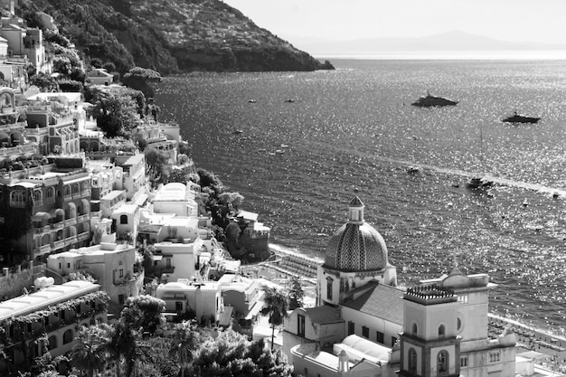 Panoramic view of the city and sea on the sunny day Positano Italy