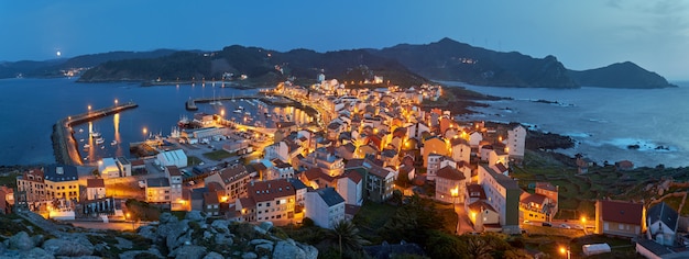 Panoramic view of the fishing village of Muxia at sunset