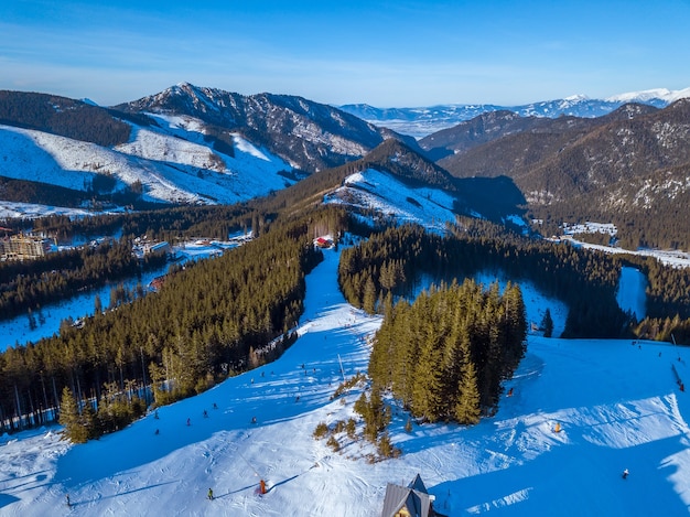 Panoramic view from the top of the snow capped mountains