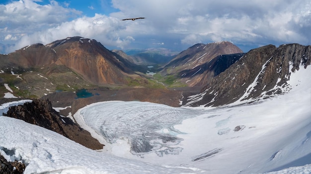 Panoramic view of a glacier on a highaltitude plateau Panorama of the glacial mountain valley in autumn Altai Mountains