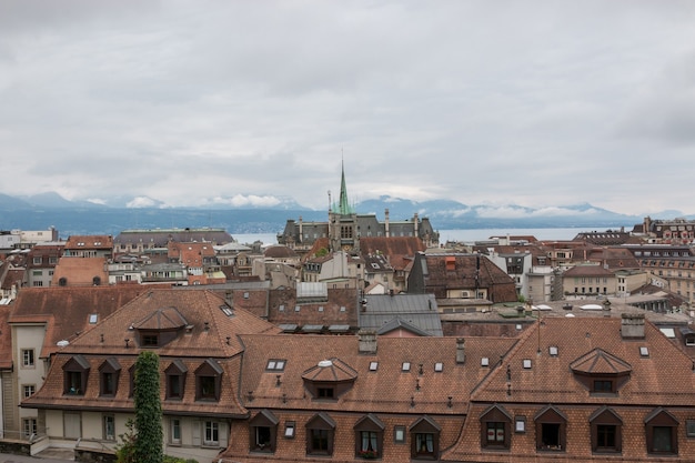 Panoramic view of historic Lausanne city center, Switzerland, Europe. Summer landscape, sunshine weather, dramatic blue sky and sunny day