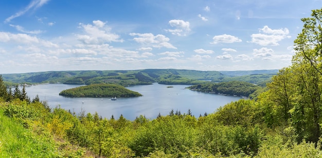 A panoramic view of the Rursee lake in the Eifel national park at summer. Taken outside with a 5D mark III.